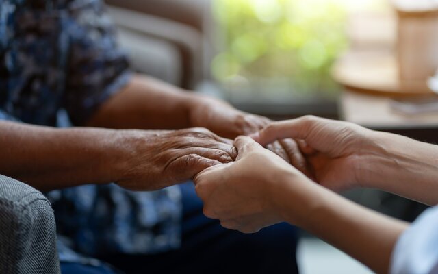 hand_elderly_woman_holding_hand_younger_woman_helping_hands_take_care